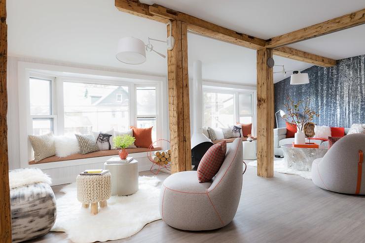 modern-cabin-living-room-design-rustic-wood-pillars.jpg