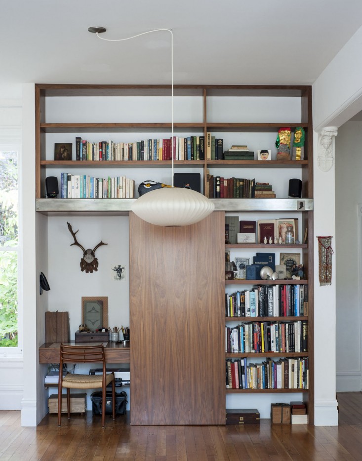 Dagmar-Daley-sliding-bookshelf-home-office-2-Remodelista.jpg
