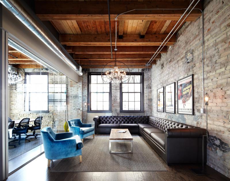 Astounding-Hire-Interior-Designer-Ideas-in-Living-Room-Industrial-design-ideas-with-blue-armchair-brick-brick-wall-chandelier-chesterfield.jpg