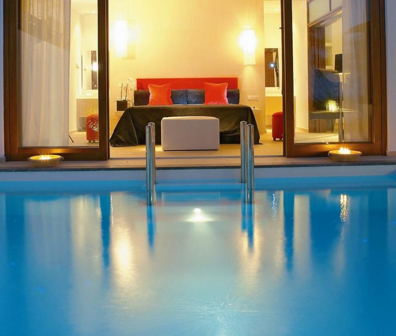 Grecotel Amirandes pool to guest bedroom.jpg